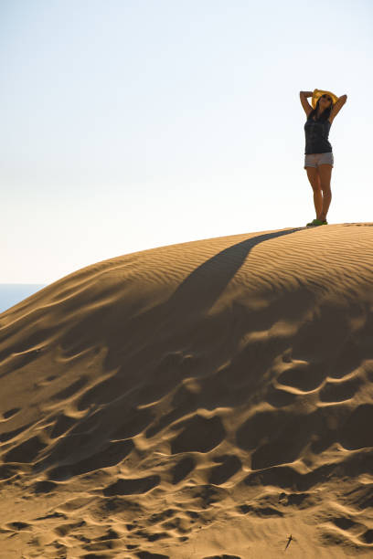 Happy woman on the desert in Patara