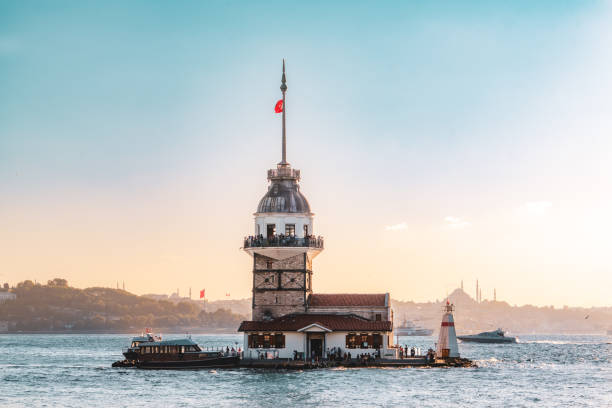 maiden's tower, istanbul sunset view of maidens tower by seaside maidens tower turkey photos stock pictures, royalty-free photos & images