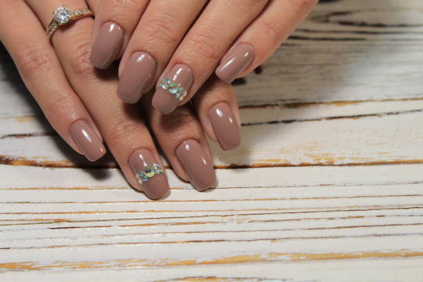 istock Women's hands with a stylish manicure. Best 1054704606
