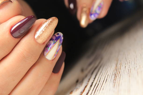 istock fashion manicure design on a beautiful texture 1054704748