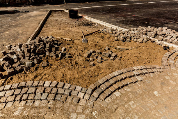 istock Stones and cobblestone blocks, construction of path 1054704966
