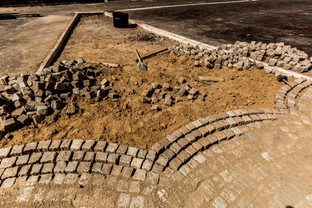 istock Stones and cobblestone blocks, construction of path 1054705670