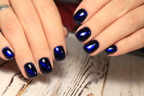 istock Women's hands with a stylish manicure. Best 1054710320
