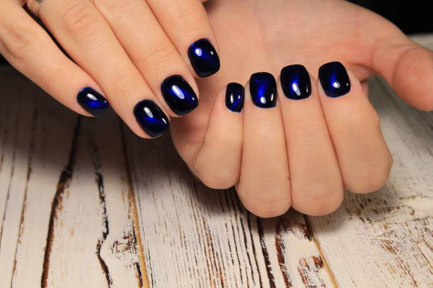 istock Women's hands with a stylish manicure. Best 1054710378