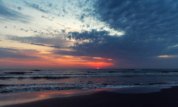 istock Amazing colorful sunrise at sea 1054710446