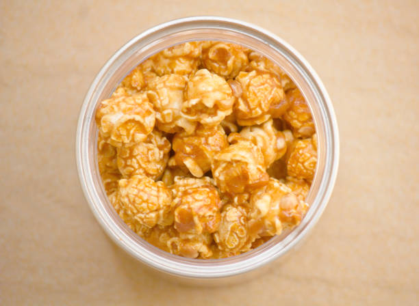 popcorn with caramel in bowl stock photo