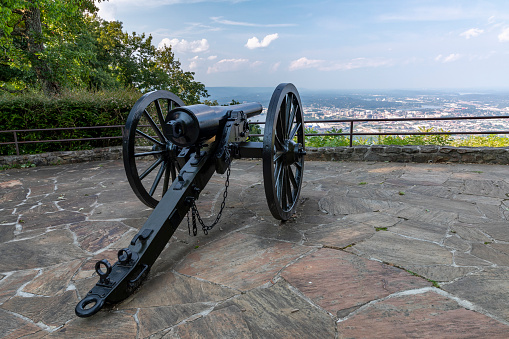An old civil war cannon at a scenic overlook.