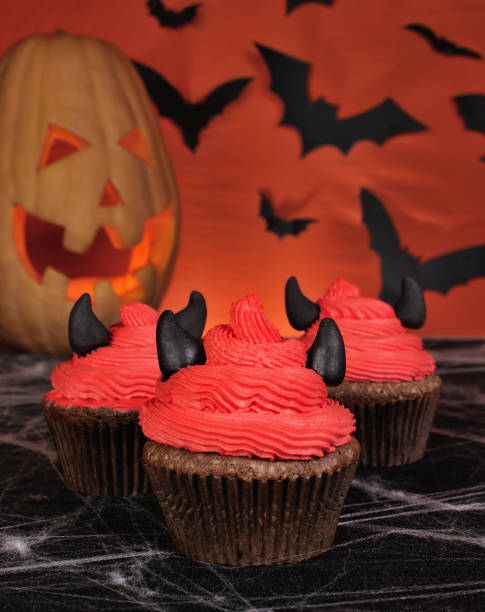 istock Muffins with cream and marzipan horns feature 1054724670
