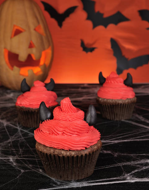 istock Muffins with cream and marzipan horns feature 1054724796