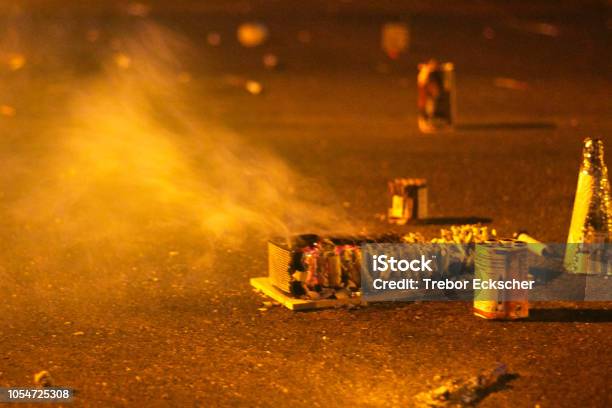 Remnants Of Burnt Pyrotechnics Firecrackers On The Road Stock Photo - Download Image Now