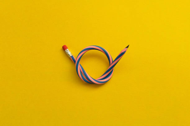 istock Flexible pencil . Isolated on yellow background 1054726562