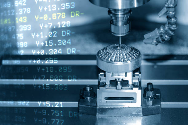istock The abstract scene of  CNC milling machine and the G-code data cutting the mold part. 1054727048