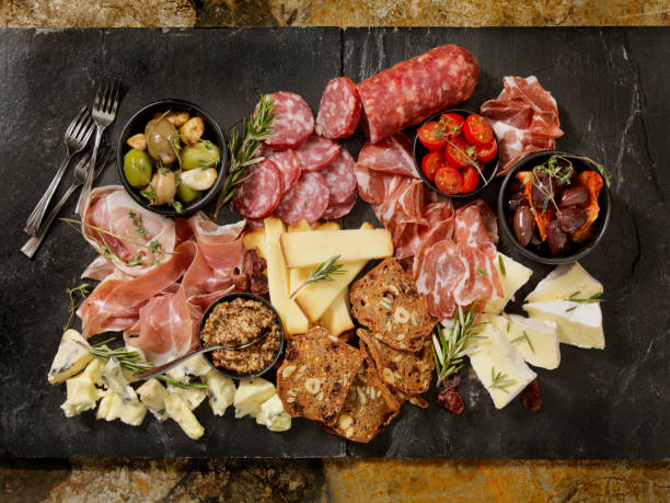 Charcuterie Board Charcuterie Board salumeria stock pictures, royalty-free photos & images