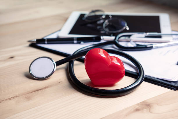 istock Stethoscope with clipboard and digital tablet on doctor desk 1054729310