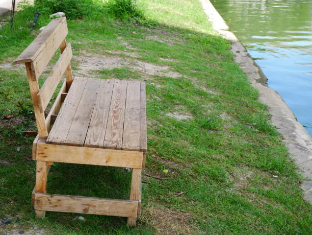 istock Bench in city public park 1054734590