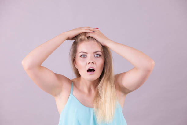 istock Emotional scared woman 1054737160