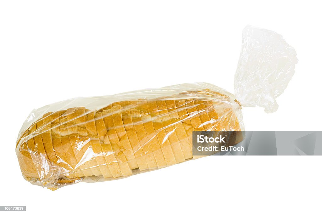 Нарезной деревенский французский хлеб в пластиковый пакет - Стоковые фото Батон роялти-фри