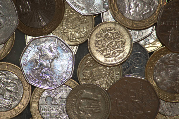 istock Commemorative coins, reverse, UK 50 pence, £1 and £2 coins 1054738652