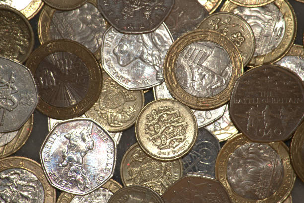 istock Commemorative coins, reverse, UK 50 pence, £1 and £2 coins 1054739280