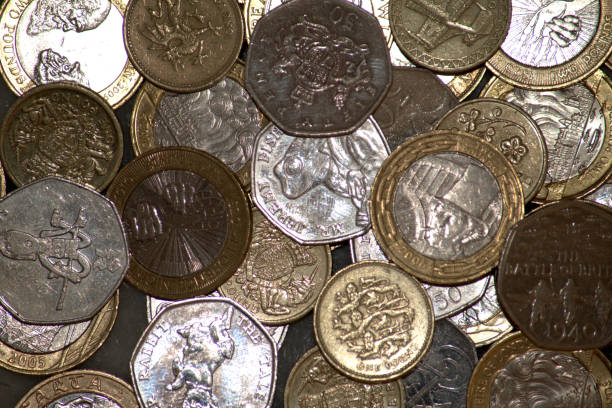 istock Commemorative coins, reverse, UK 50 pence, £1 and £2 coins 1054739330