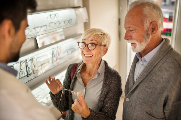 istock Senior couple shopping for eyeglasses 1054739432