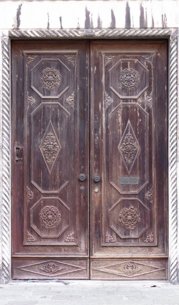 istock old brown wooden door 1054752576