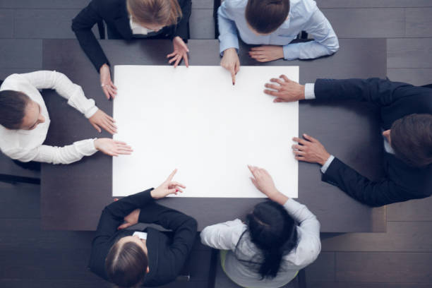 istock Business people and blank paper 1054761242