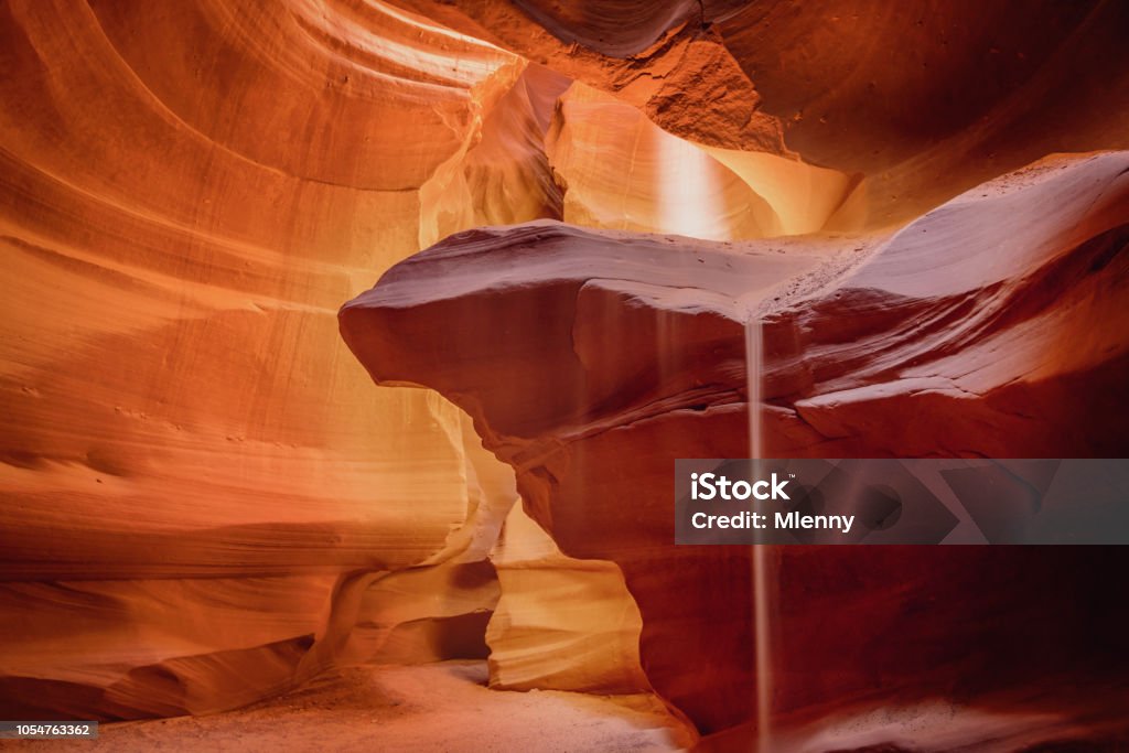 Little Sand Fall Antelope Canyon Page Arizona USA Little Sand Fall inside beautiful Antelope Canyon in early morning light. Long time Exposure. Motion Blured Sand Fall in the Canyon. Page, Arizona, USA Nature Stock Photo