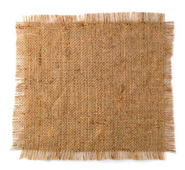 istock A piece of old natural fabric on a white background. 1054774524