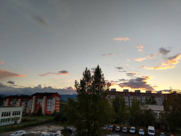 istock Sunrise and sunset over the hills and town. 1054778070