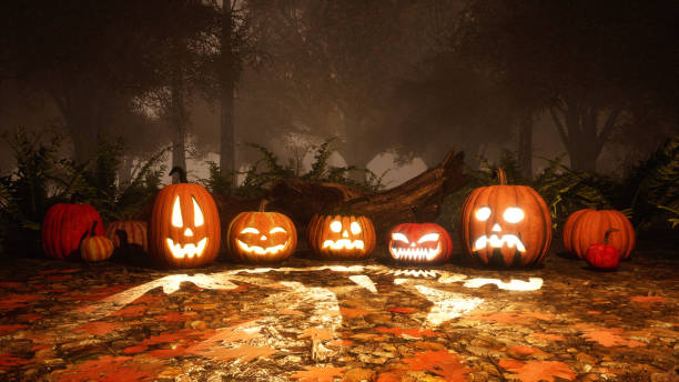 istock Jack-o-lantern pumpkins in autumn forest at dusk 1054787200