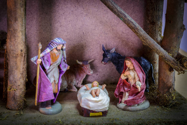 Christmas Ornament Nativity scene of Bethlehem Mary, Joseph and Jesus The Angel The cow and the ox Christmas Ornament Nativity scene of Bethlehem Mary, Joseph and Jesus The Angel The cow and the ox shepherd sheep lamb bible stock pictures, royalty-free photos & images