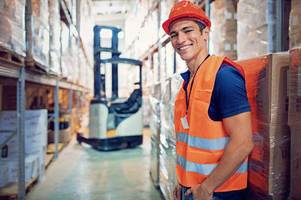 istock Portrait of a worker in the warehouse 1054790192