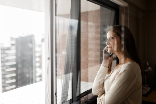 istock Woman using smart phone at office 1054793860