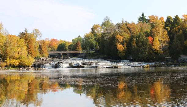 istock Fall colors in reflecting in water 1054797998