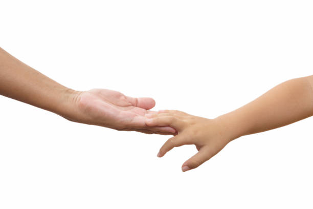 istock Young mother Hand with her sons hand 1054805904