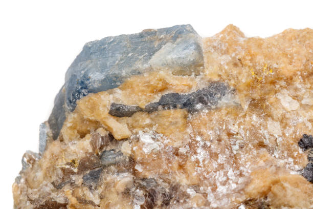 istock Macro mineral stone Corundum in rock a white background 1054811674