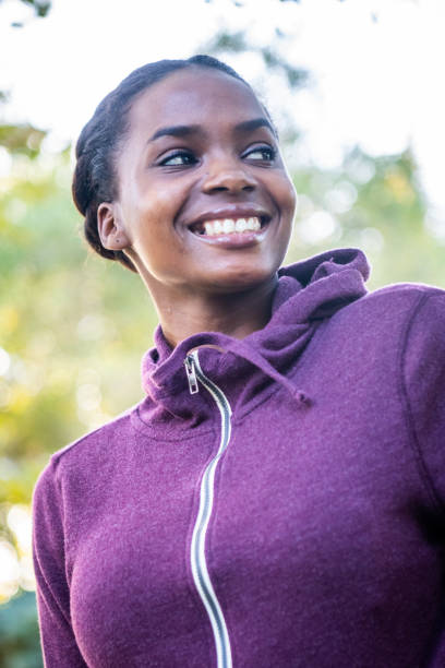 istock Smiling beautiful young black woman 1054812218