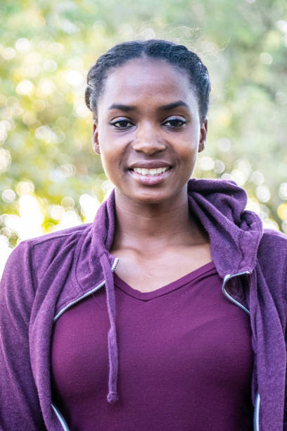 istock Smiling beautiful young black woman 1054812274