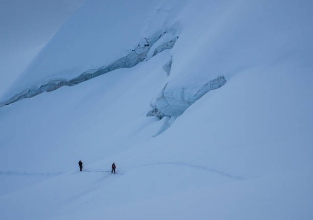 istock Climbers couple on a glacier. 1054812416