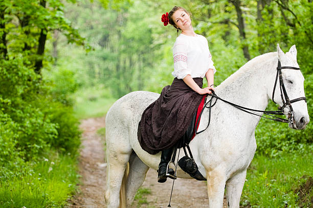istock Cheerful girl riding horse 105481436