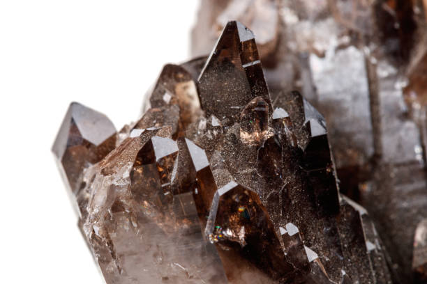 istock Macro mineral stone Morion crystal in the rock a white background 1054816236