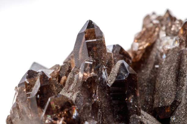 istock Macro mineral stone Morion crystal in the rock a white background 1054818544