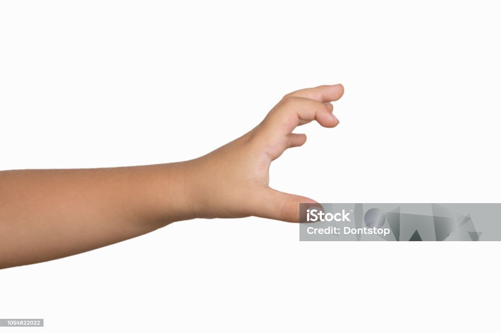 Cute Little boy hand holding something on white background. Cute Little boy hand making grab some items isolated on white background. Child Stock Photo