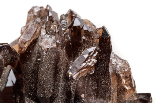 istock Macro mineral stone Morion crystal in the rock a white background 1054827202