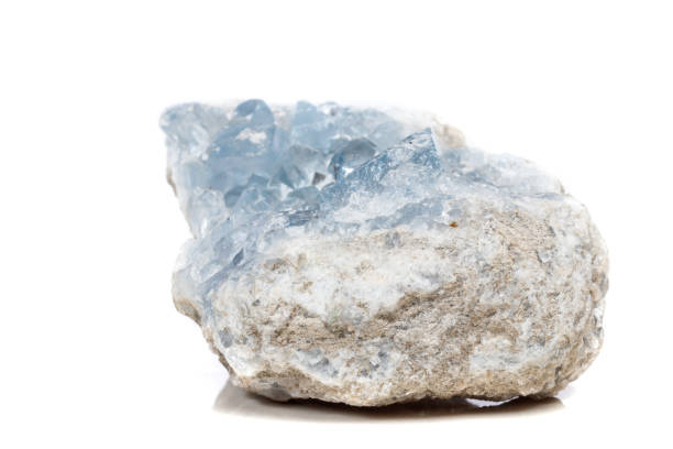 istock Macro mineral stone Celestine in the breed a white background 1054828730
