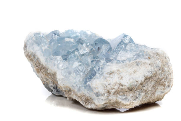 istock Macro mineral stone Celestine in the breed a white background 1054829006