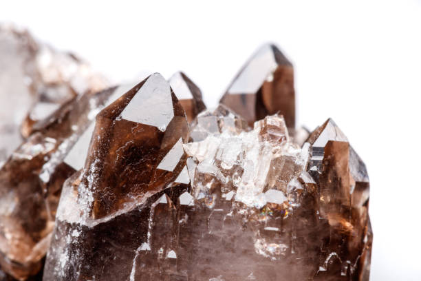istock Macro mineral stone Morion crystal in the rock a white background 1054829334