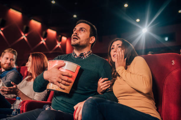 istock Shocked couple at cinema 1054829550