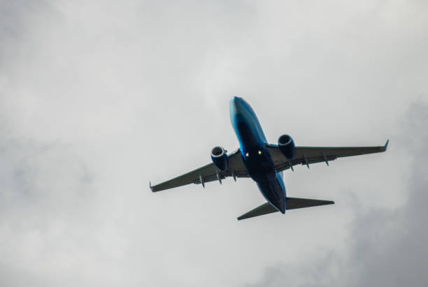 istock Modern passenger aircraft in the sky 1054838530